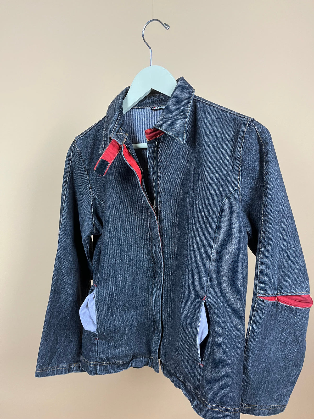 Y2K dark wash denim jacket with vibrant red lining and structured collar — Arkive Vintage
