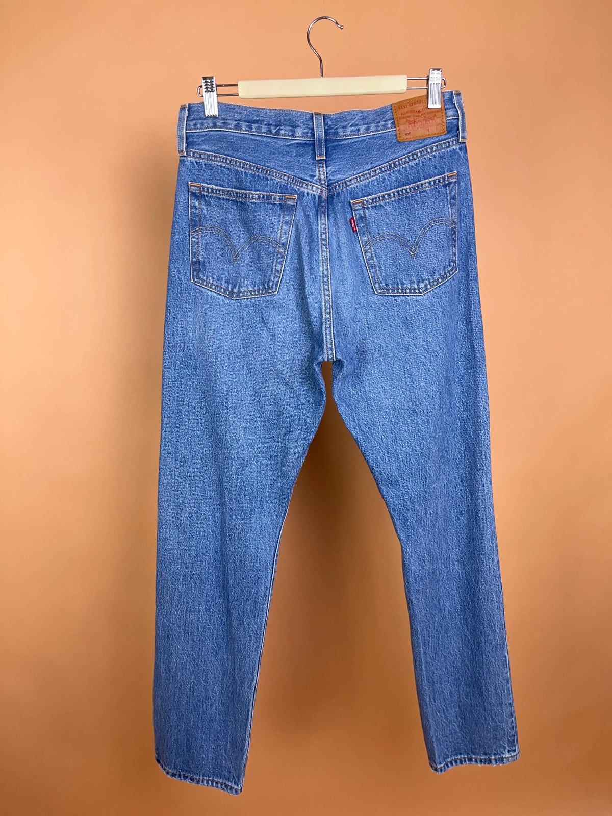 Levi's 501 mid blue straight leg jeans with intentional distressing — Arkive Vintage