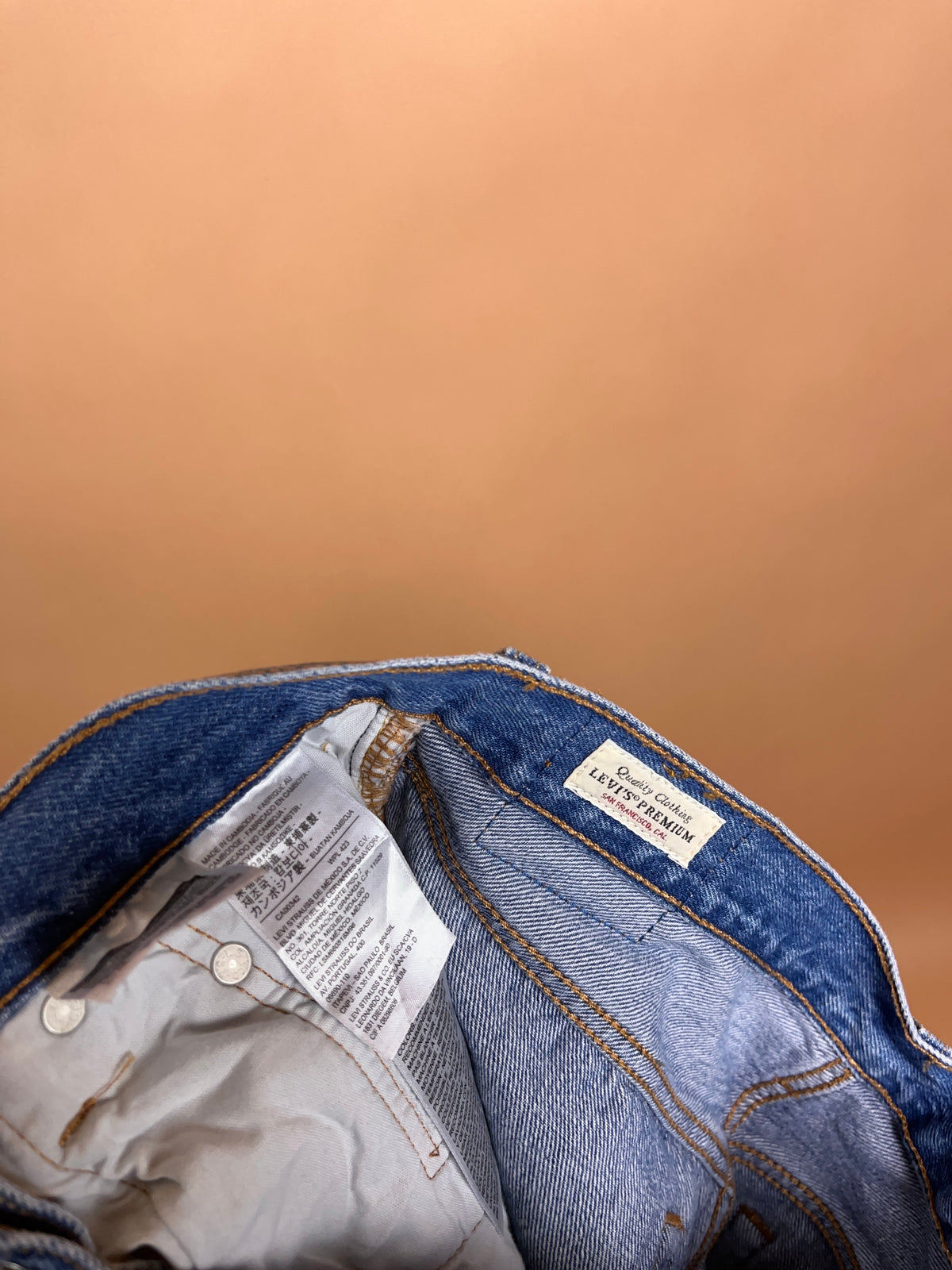 Levi's 501 mid blue straight leg jeans with intentional distressing — Arkive Vintage