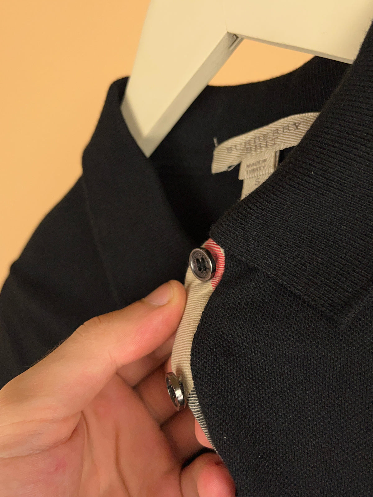 Burberry Brit black cotton pique polo shirt with plaid placket lining — Arkive Vintage