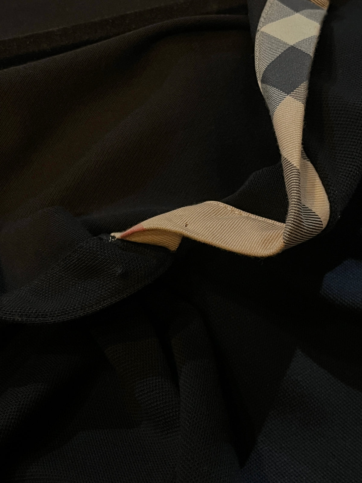 Y2K Burberry Brit black cotton pique V-neck polo, Nova check placket — Arkive Vintage