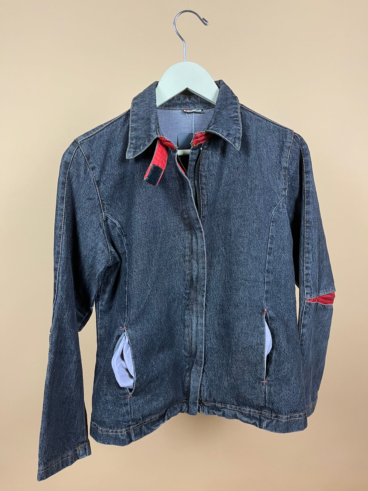 Y2K dark wash denim jacket with vibrant red lining and structured collar — Arkive Vintage