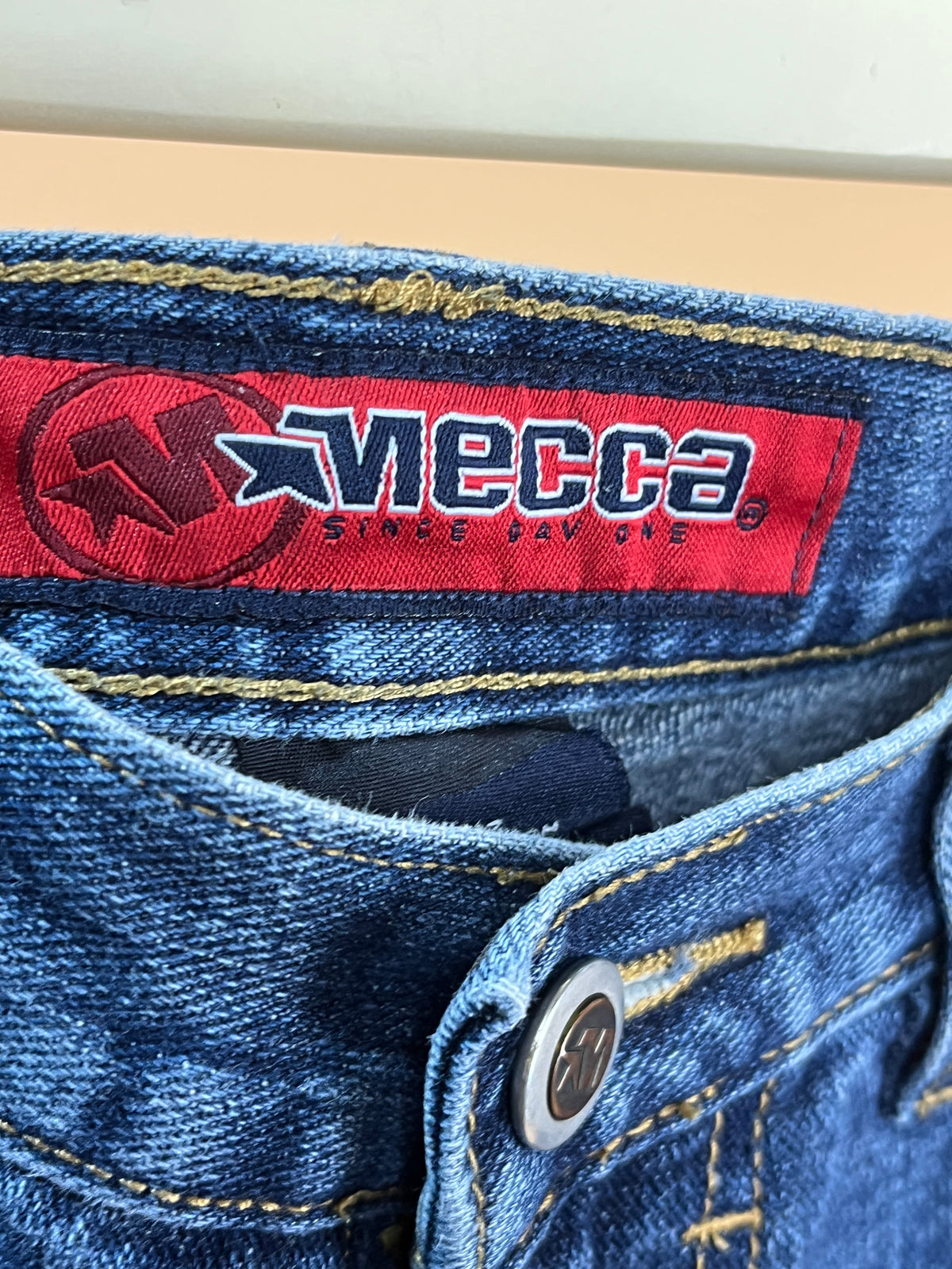 Y2K Mecca USA baggy jeans with bleached spell-out logo, vintage wash, waist 29 — Arkive Vintage