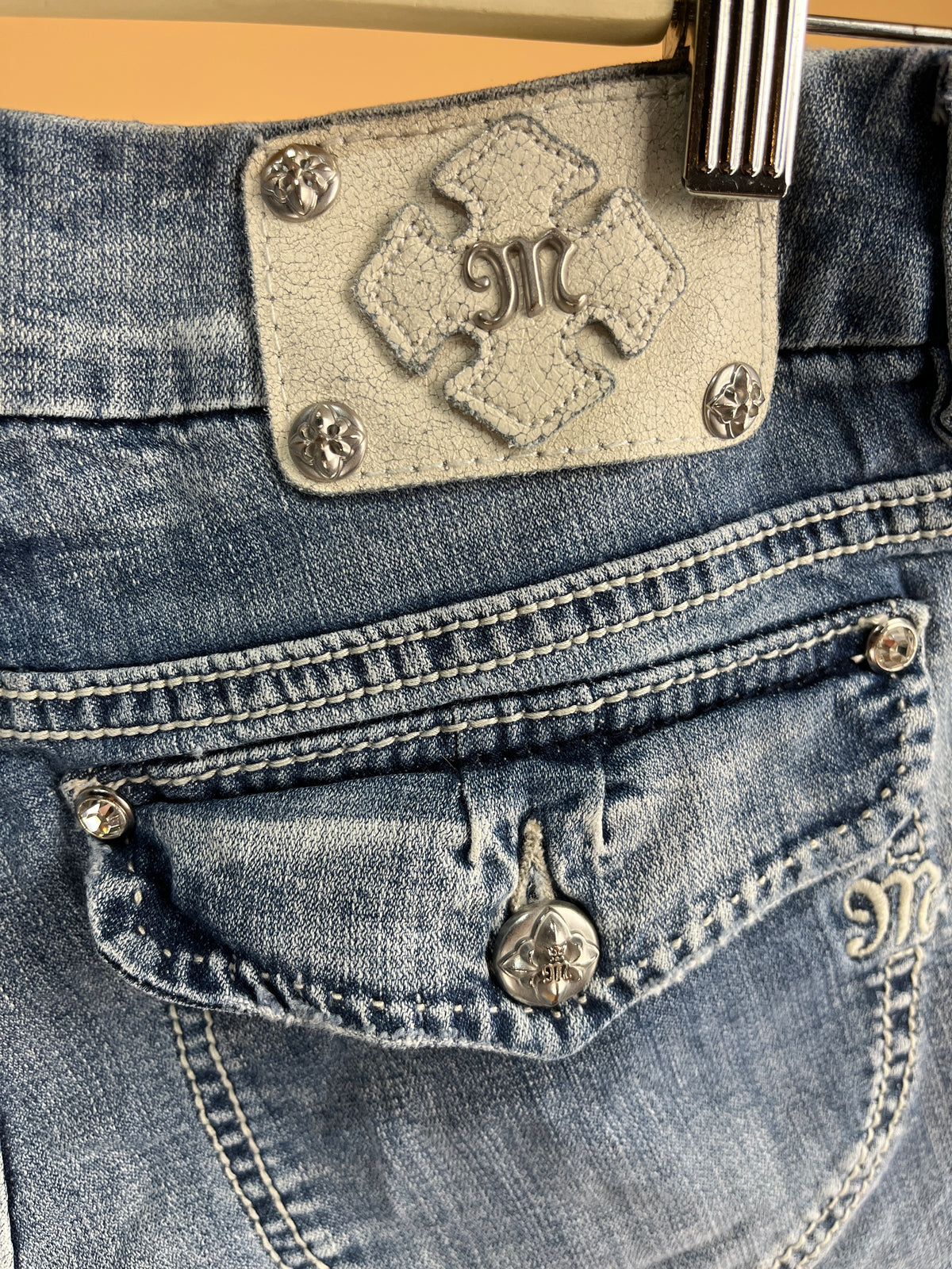 Y2K Miss Me distressed denim micro shorts with diamanté hardware, size 10 — Arkive Vintage