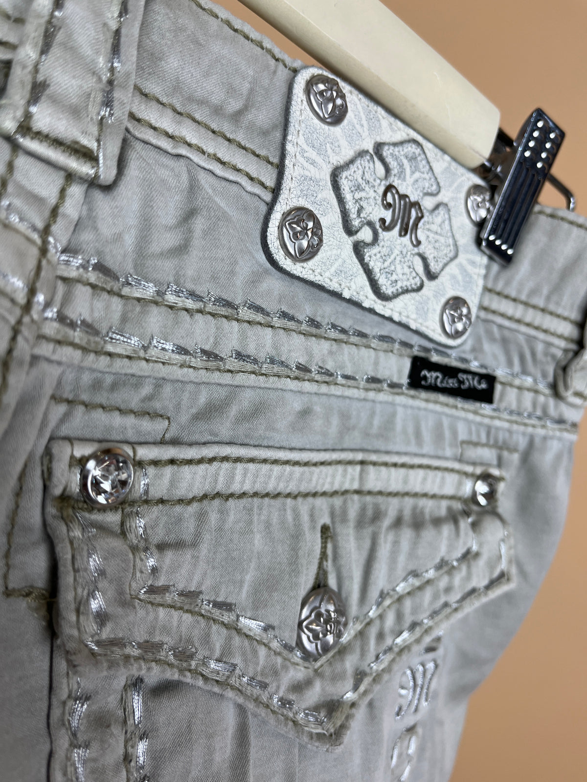 Y2K Miss Me silvery grey micro shorts with diamanté embellished back pockets — Arkive Vintage