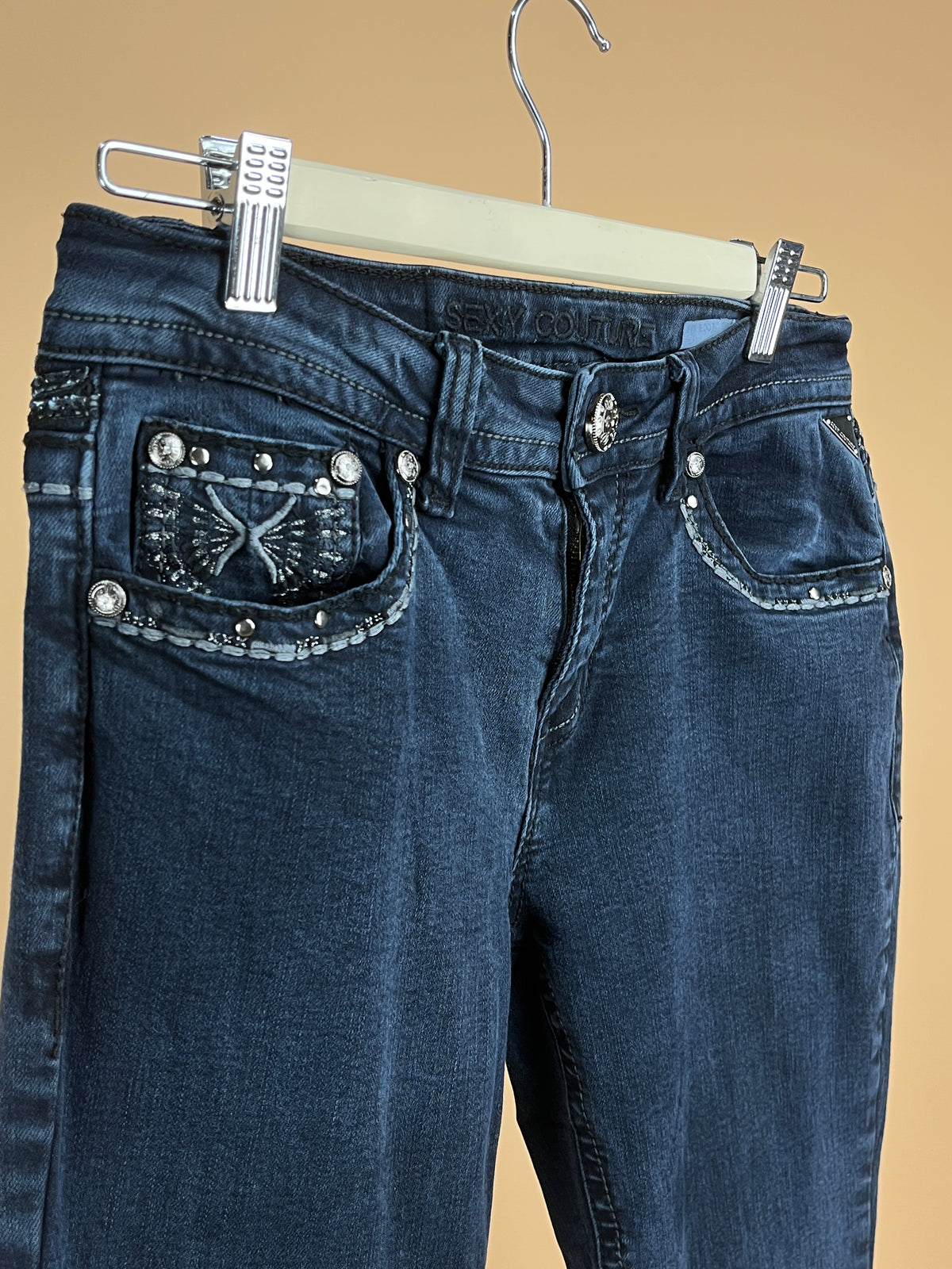 Y2K dark wash straight leg jeans with rhinestone wing design back pockets — Arkive Vintage