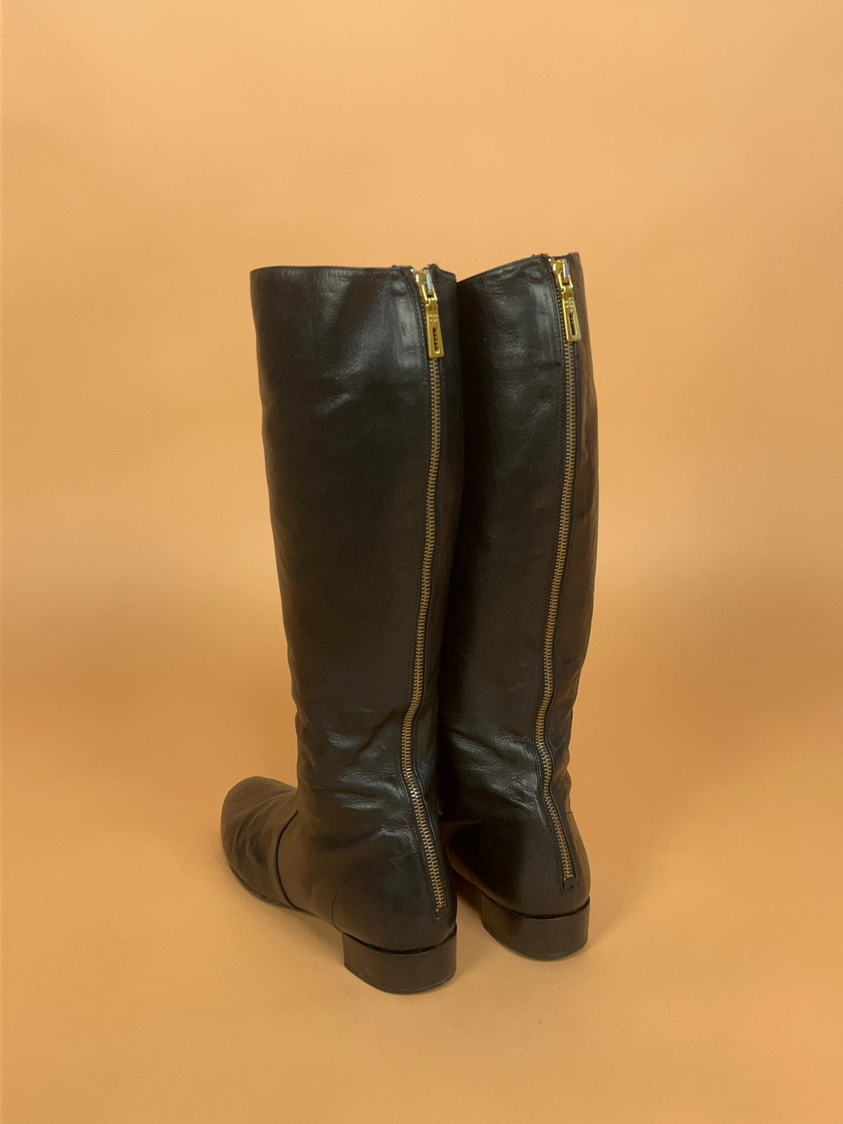 Y2K Prada crinkled black leather knee-high boots with gold-tone zip pull — Arkive Vintage
