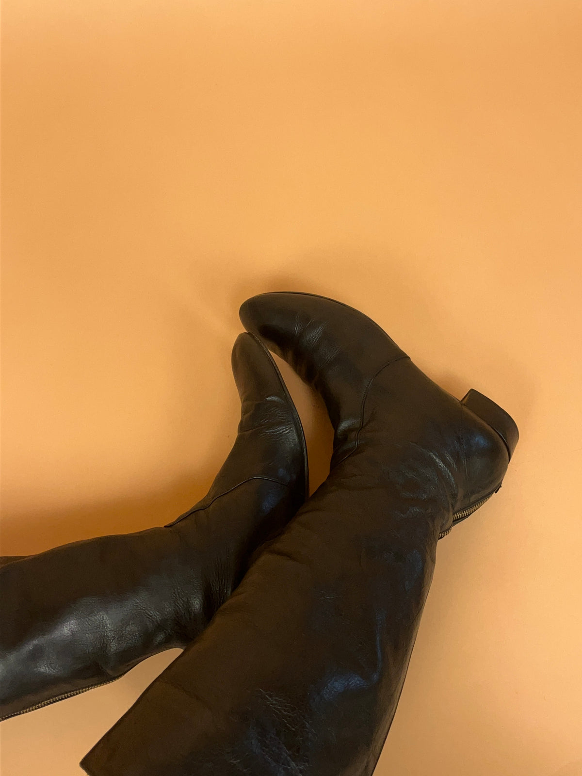 Y2K Prada crinkled black leather knee-high boots with gold-tone zip pull — Arkive Vintage