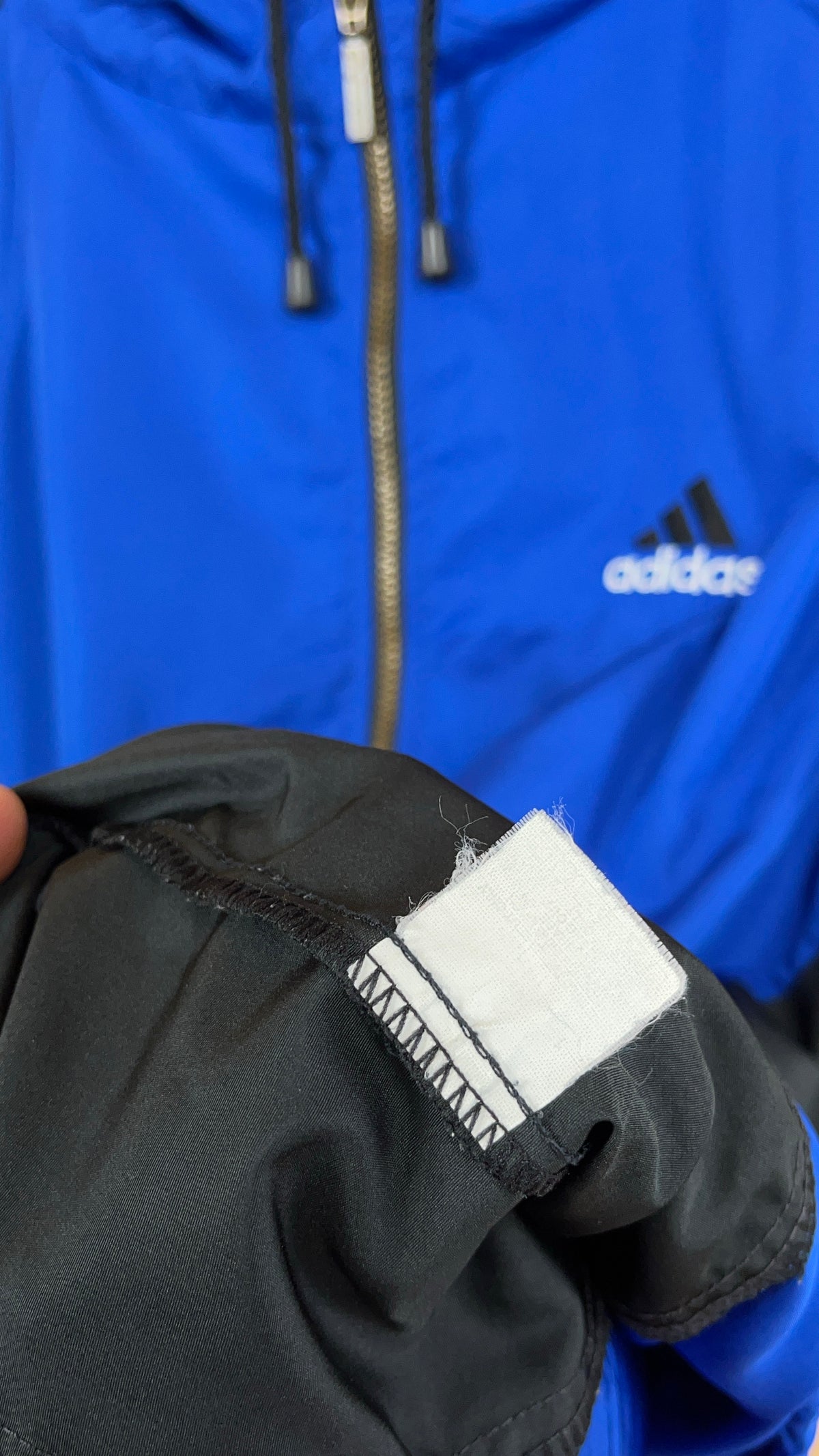 Vintage Adidas electric blue and black hooded windbreaker with welt pockets — Arkive Vintage