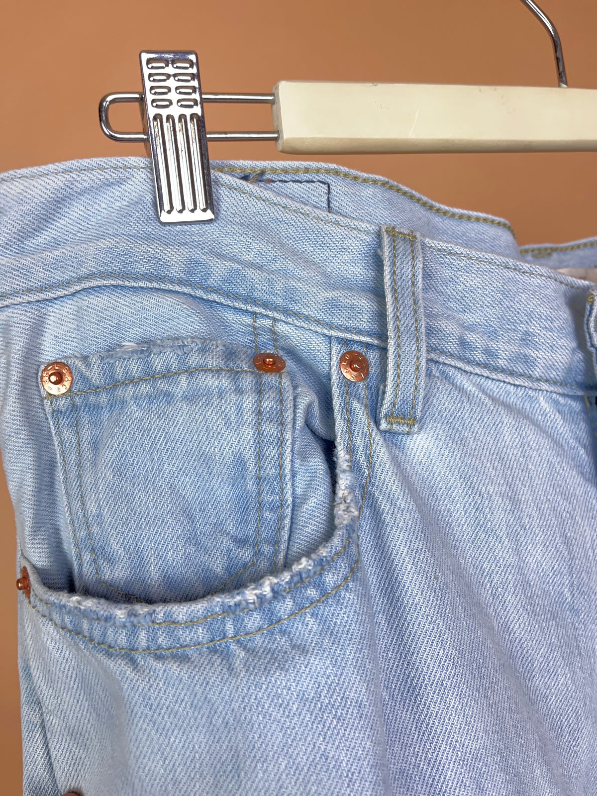 Levi's pale ice-blue straight leg jeans with frayed knee distressing — Arkive Vintage