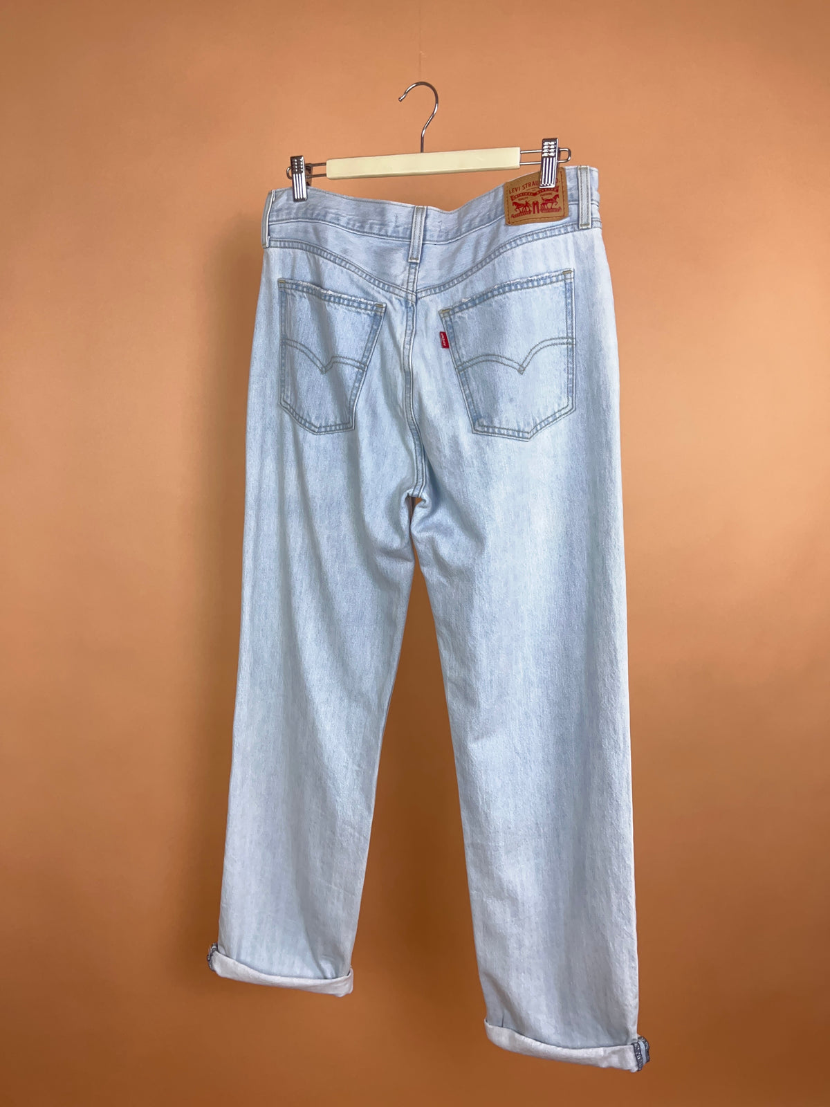 Levi's pale ice-blue straight leg jeans with frayed knee distressing — Arkive Vintage