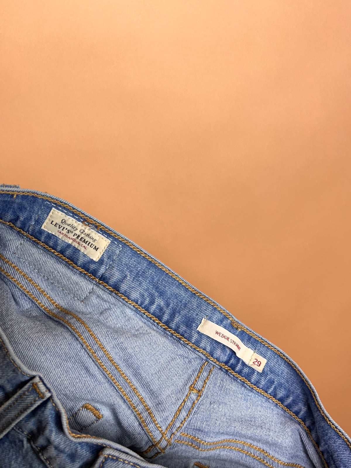 Levi's 501 light acid wash high-rise straight leg jeans with raw hem — Arkive Vintage