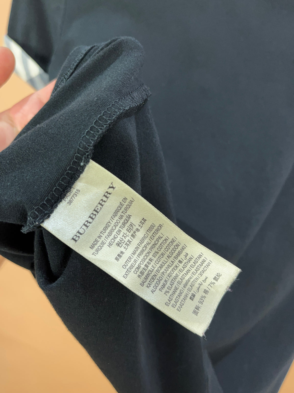 Y2K Burberry Brit black stretch cotton t-shirt with Nova check cuffs — Arkive Vintage